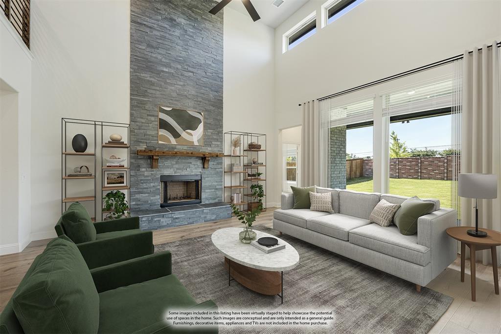 729 Seahawk Street Joshua, TX 76058 - Photo 12 of 40 a living room with furniture and a fireplace