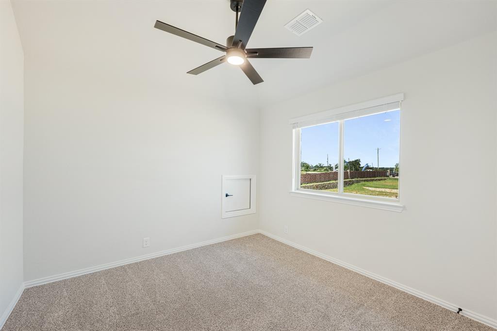 729 Seahawk Street Joshua, TX 76058 - Photo 35 of 40 a view of an empty room with a window