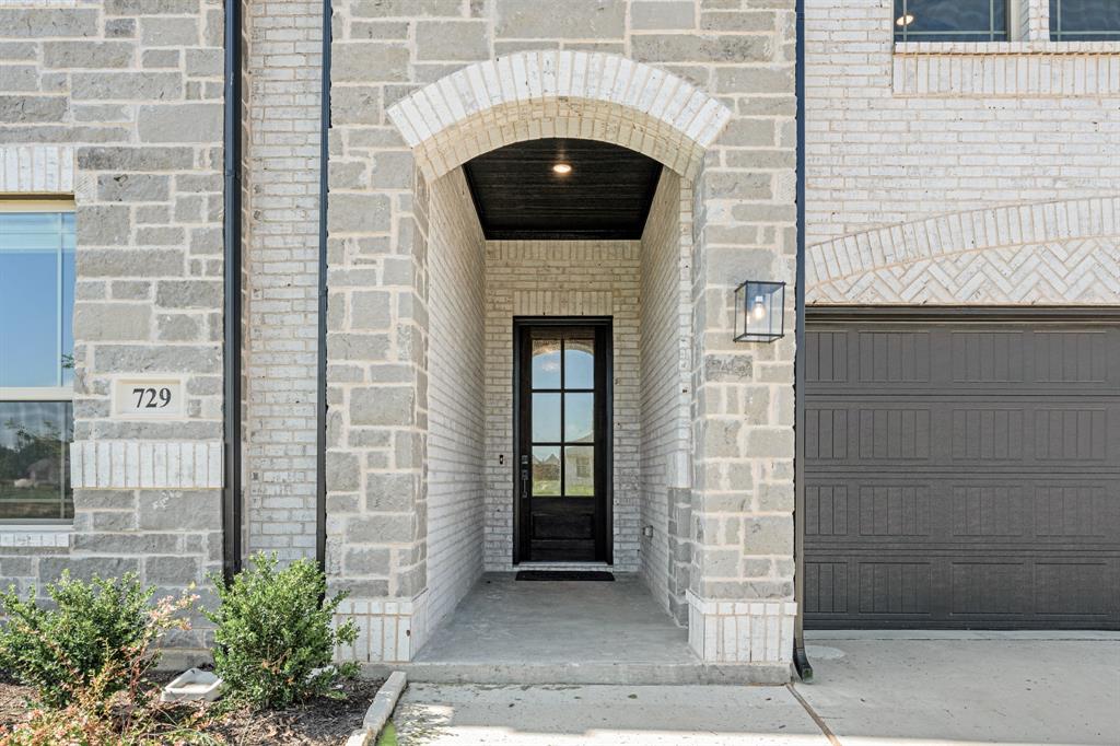 729 Seahawk Street Joshua, TX 76058 - Photo 4 of 40 a front view of a house with a gate