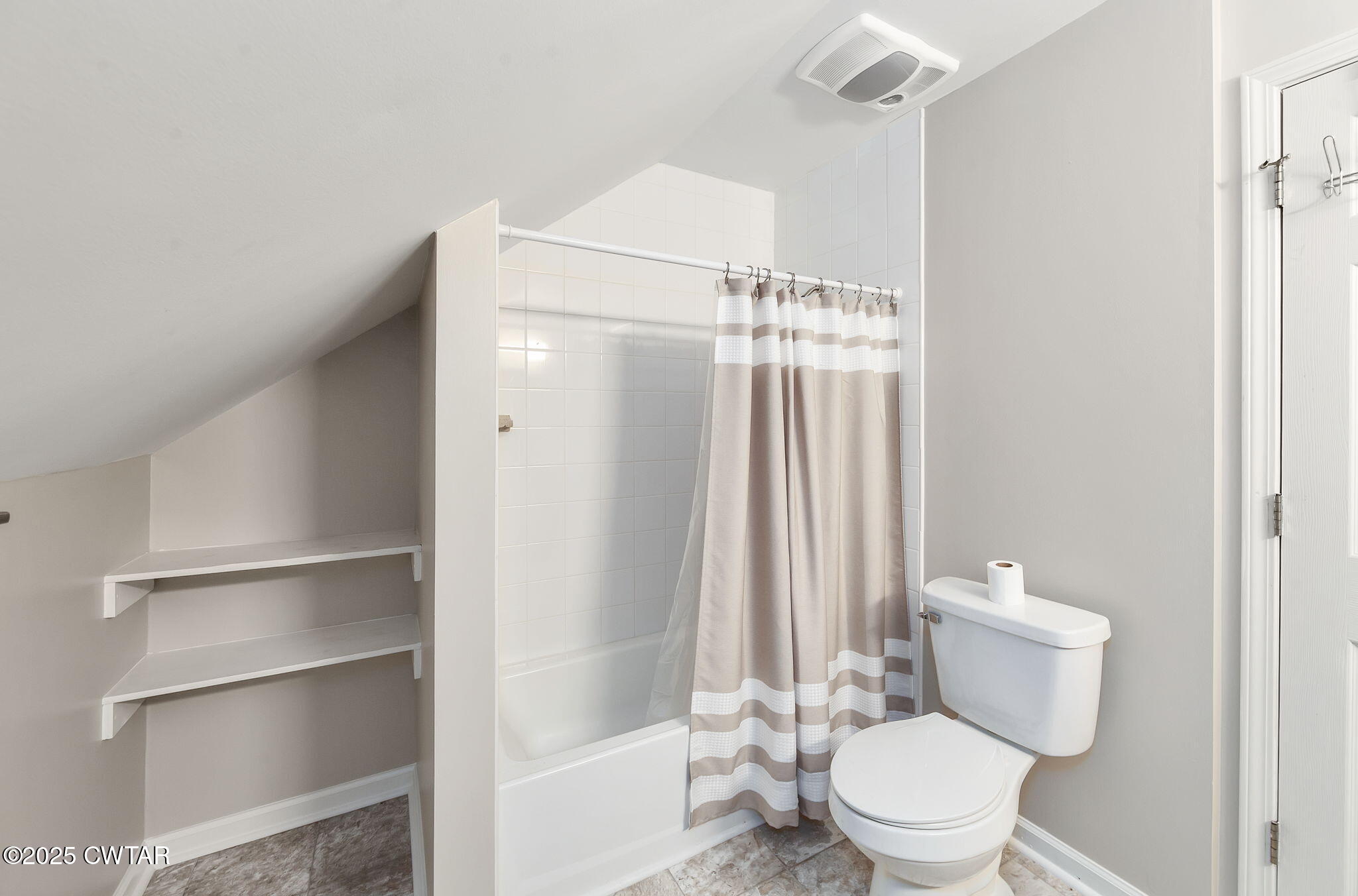 463 MCO Road Jackson, TN 38305 - Photo 30 of 36 a bathroom with a toilet and a shower