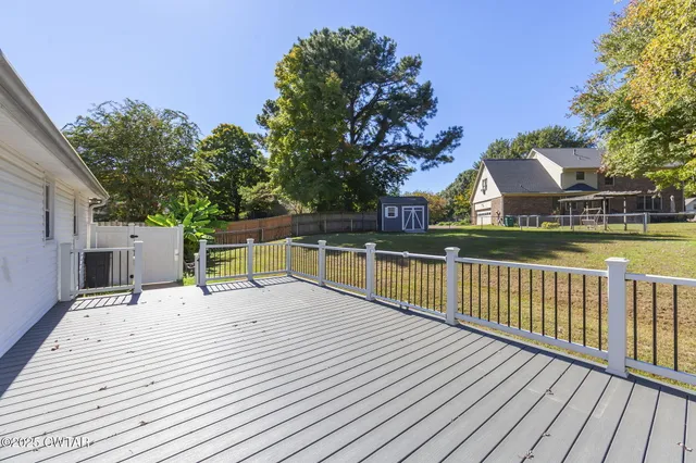 a view of a house with a deck