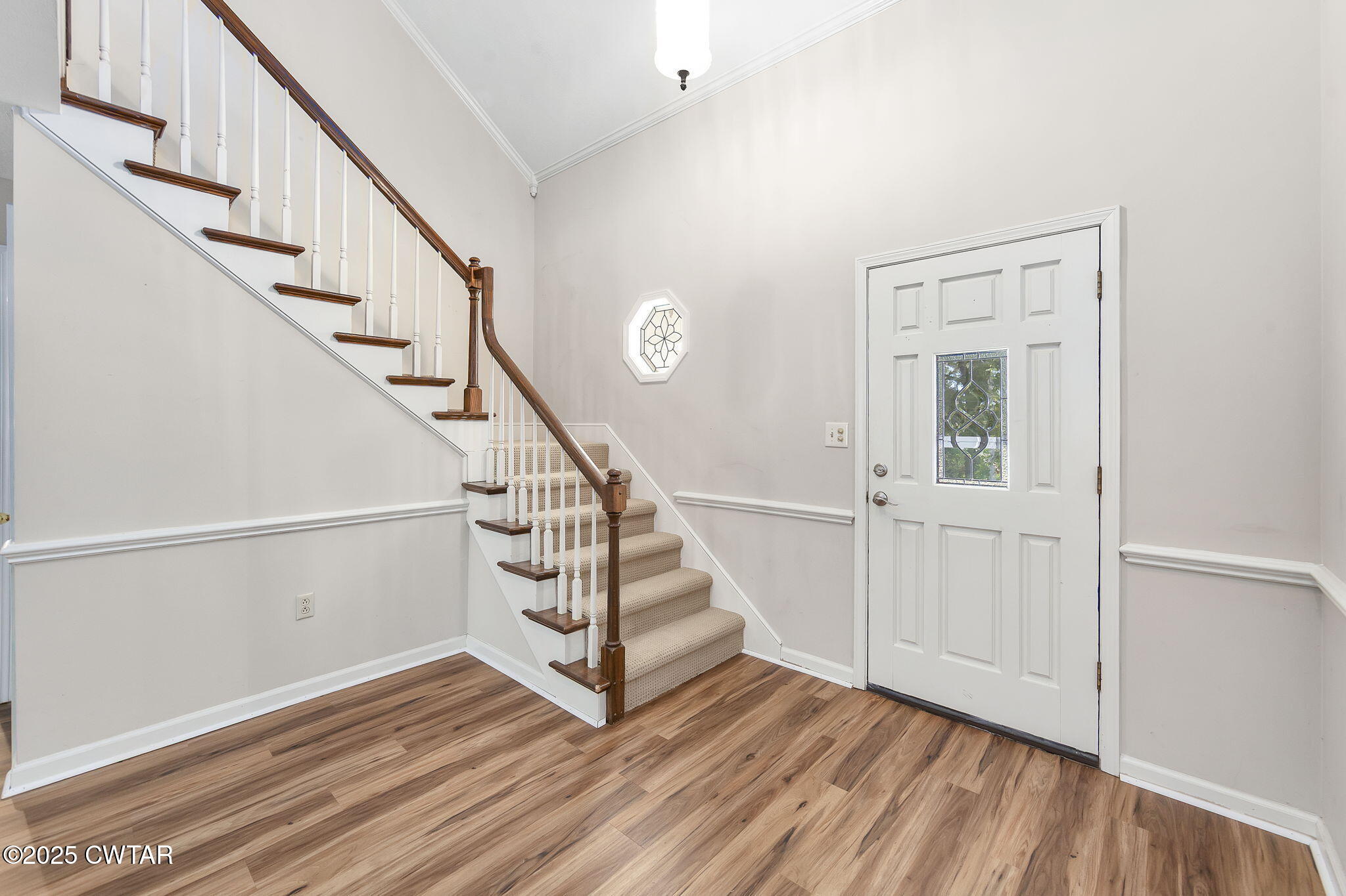 463 MCO Road Jackson, TN 38305 - Photo 5 of 36 a view of entryway with wooden floor and stairs