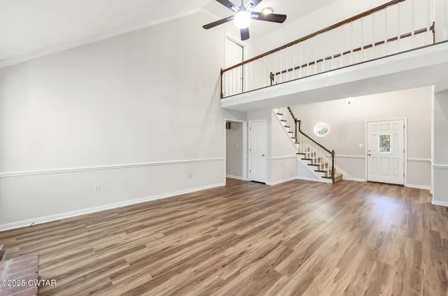a view of a livingroom with wooden floor