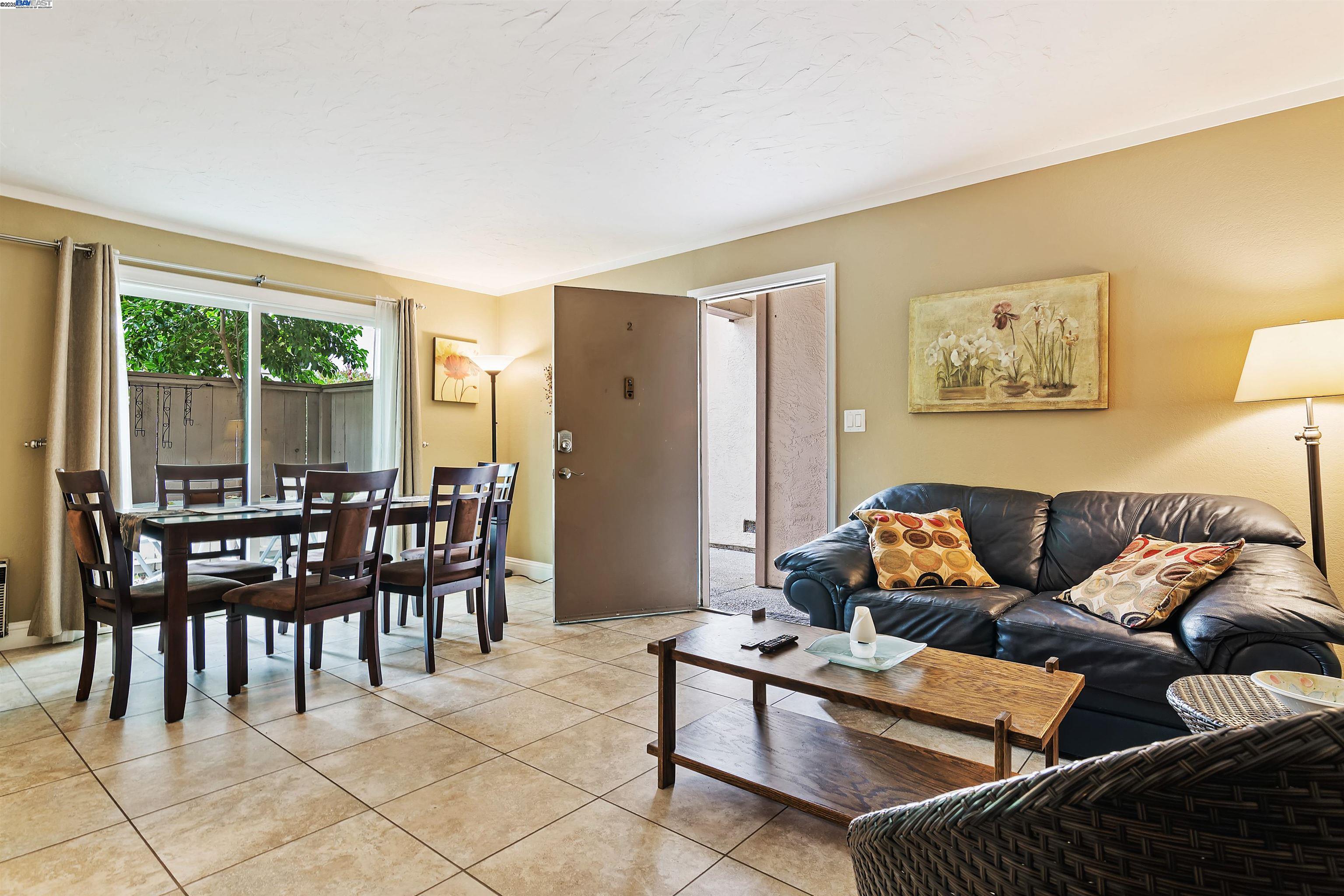 385 Camelback Road, Unit 2 Pleasant Hill, CA 94523 - Photo 2 of 19 a living room with furniture and a large window