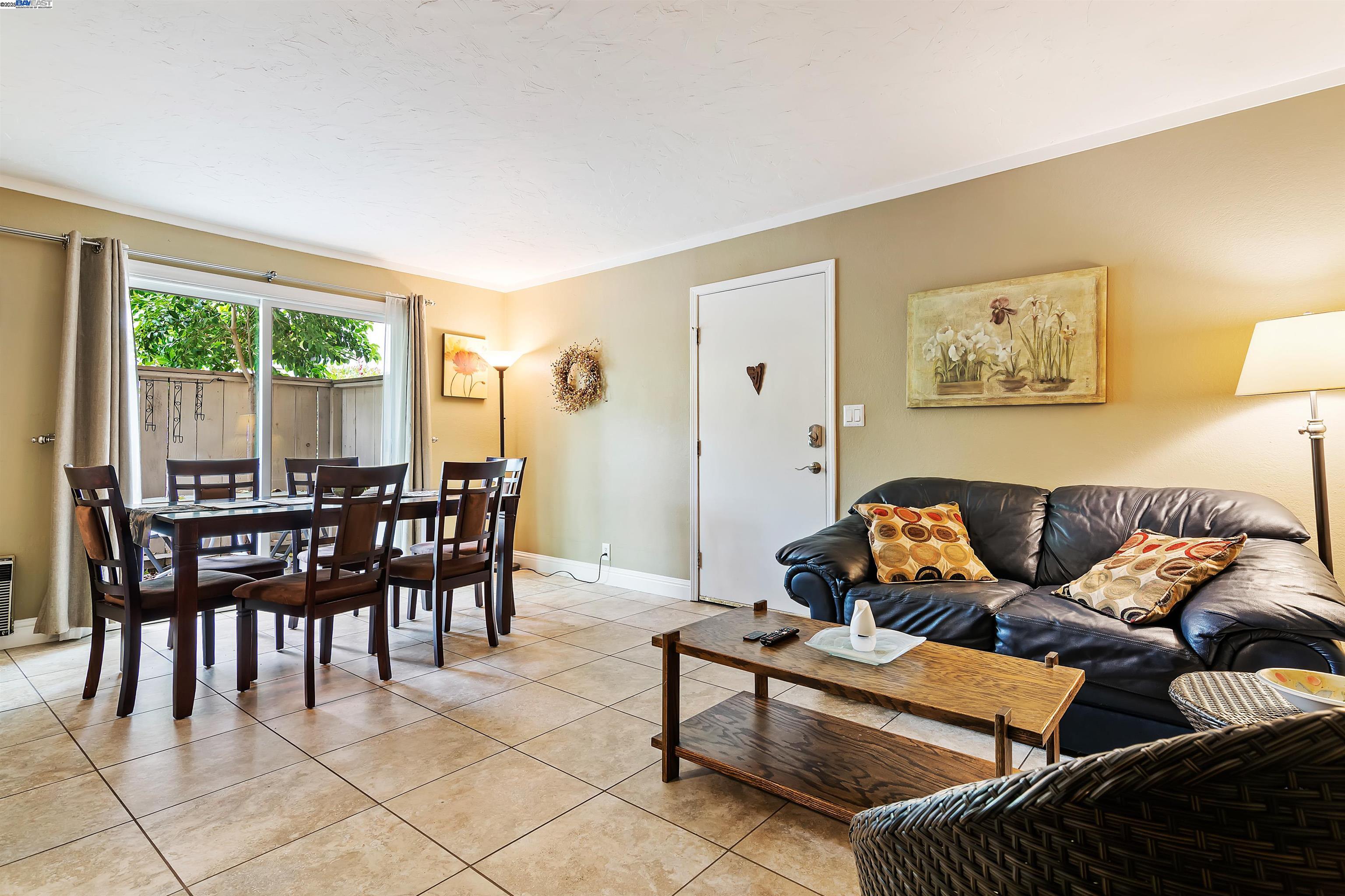 385 Camelback Road, Unit 2 Pleasant Hill, CA 94523 - Photo 3 of 19 a living room with furniture and a large window