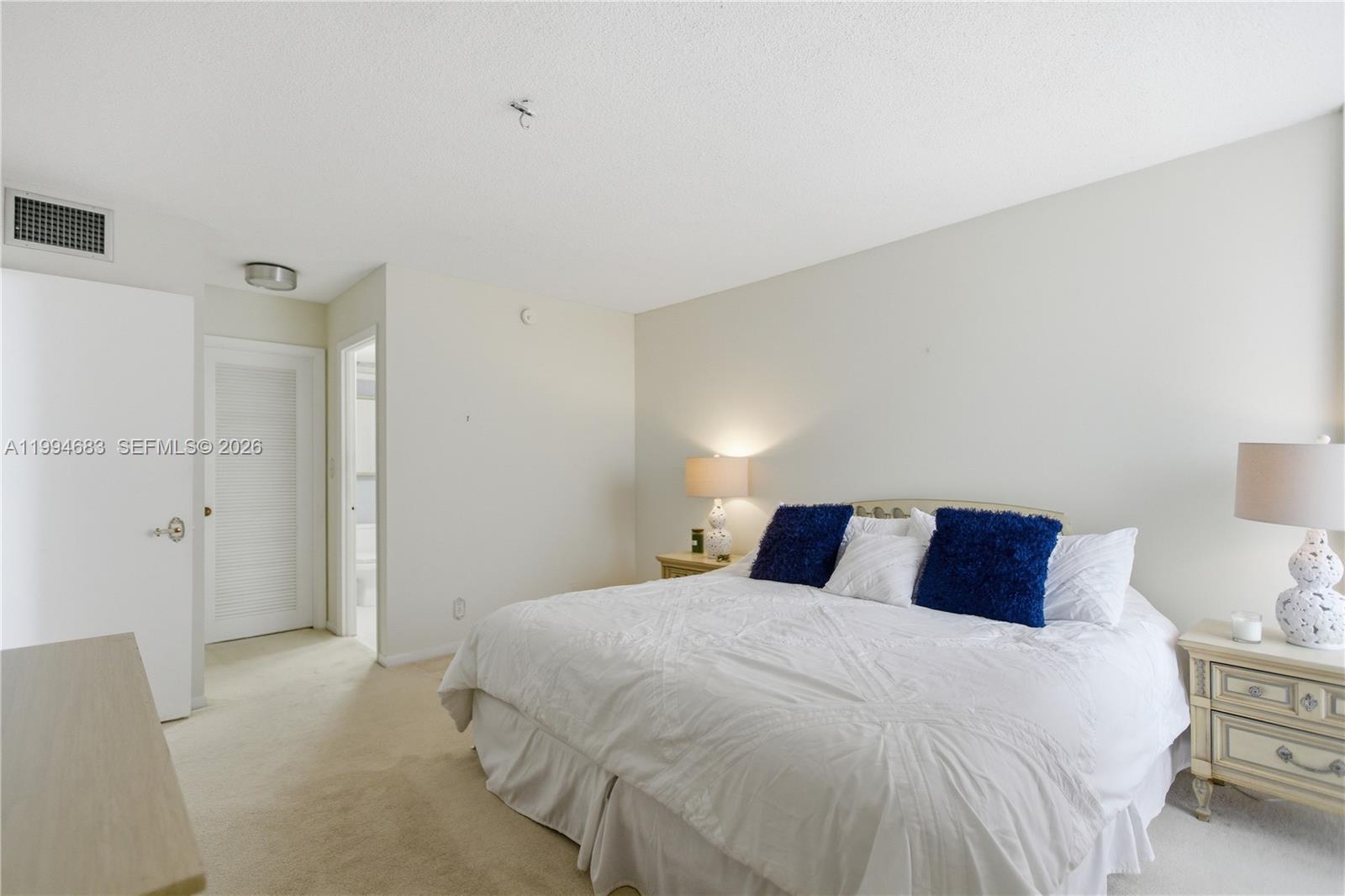 555 Northwest 4th Avenue, Unit 4190 Boca Raton, FL 33432 - Photo 17 of 23 Primary Bedroom