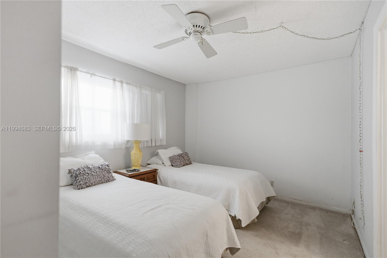 555 Northwest 4th Avenue, Unit 4190 Boca Raton, FL 33432 - Photo 19 of 23 Guest Bedroom