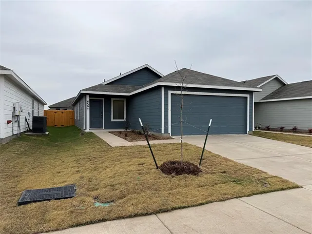 a house view with a backyard space