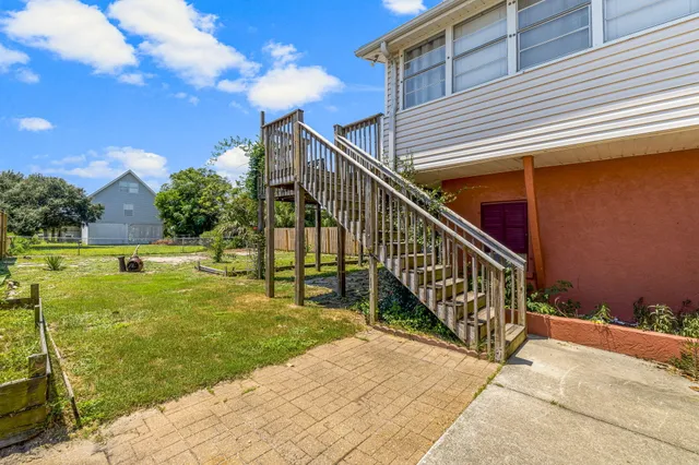 a view of swimming pool with a patio