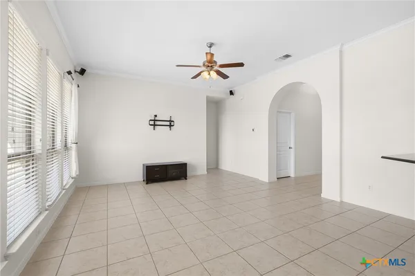 a kitchen with stainless steel appliances granite countertop a refrigerator stove and sink