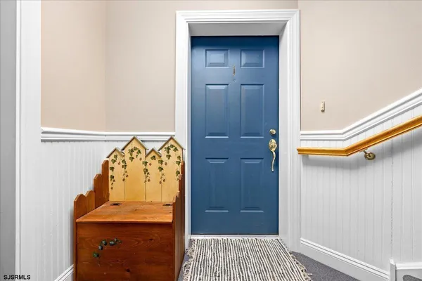 a bedroom with bed and window