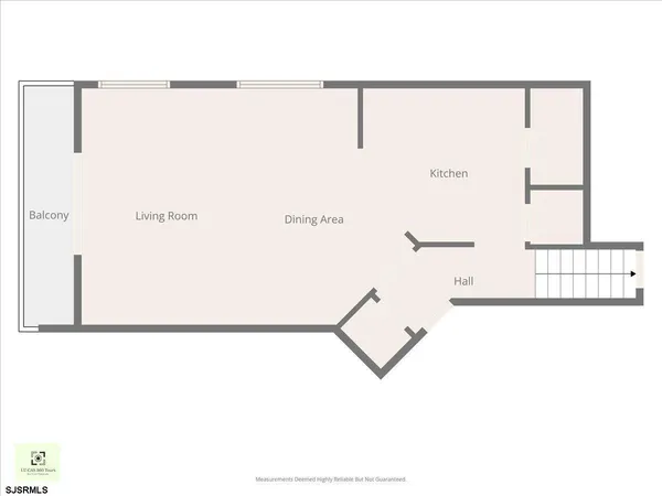 a bedroom with a bed window and a table