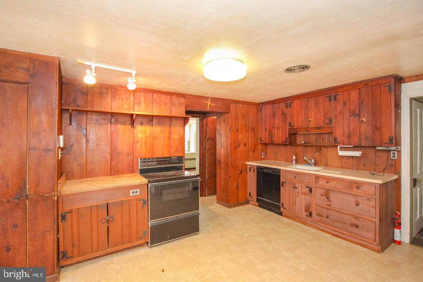 432 Old Forge Road Media, PA 19063 - Photo 11 of 41 a kitchen with stainless steel appliances granite countertop a stove a sink and a refrigerator