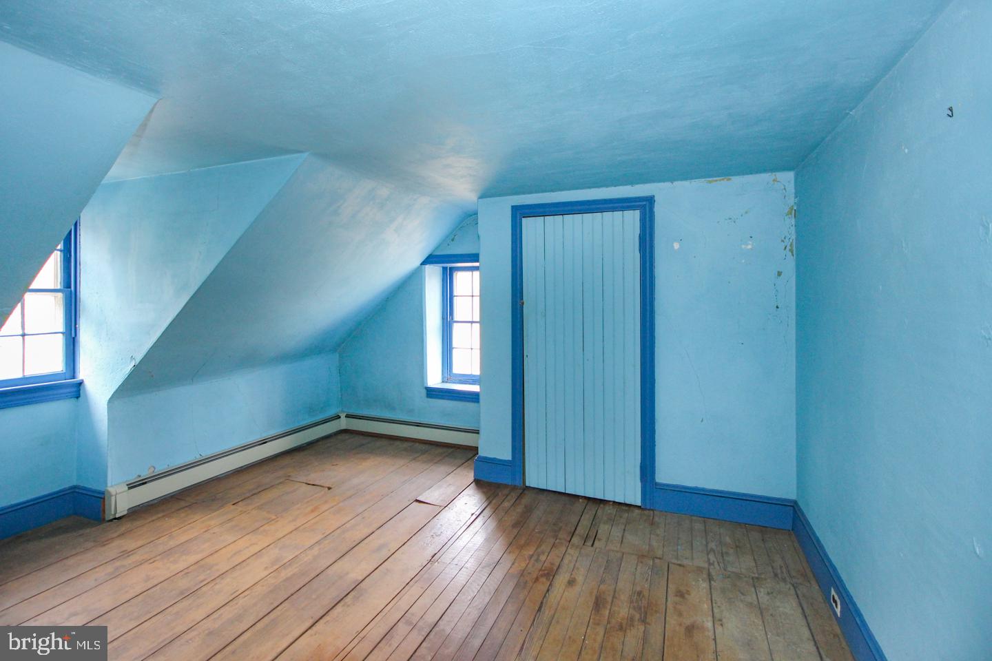 432 Old Forge Road Media, PA 19063 - Photo 30 of 41 an empty room with wooden floor and windows