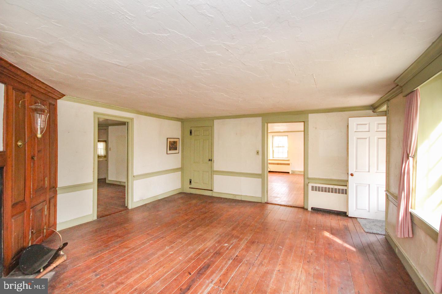 432 Old Forge Road Media, PA 19063 - Photo 4 of 41 an empty room with wooden floor and windows