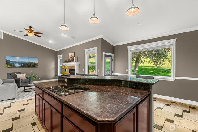a kitchen with a stove and a sink