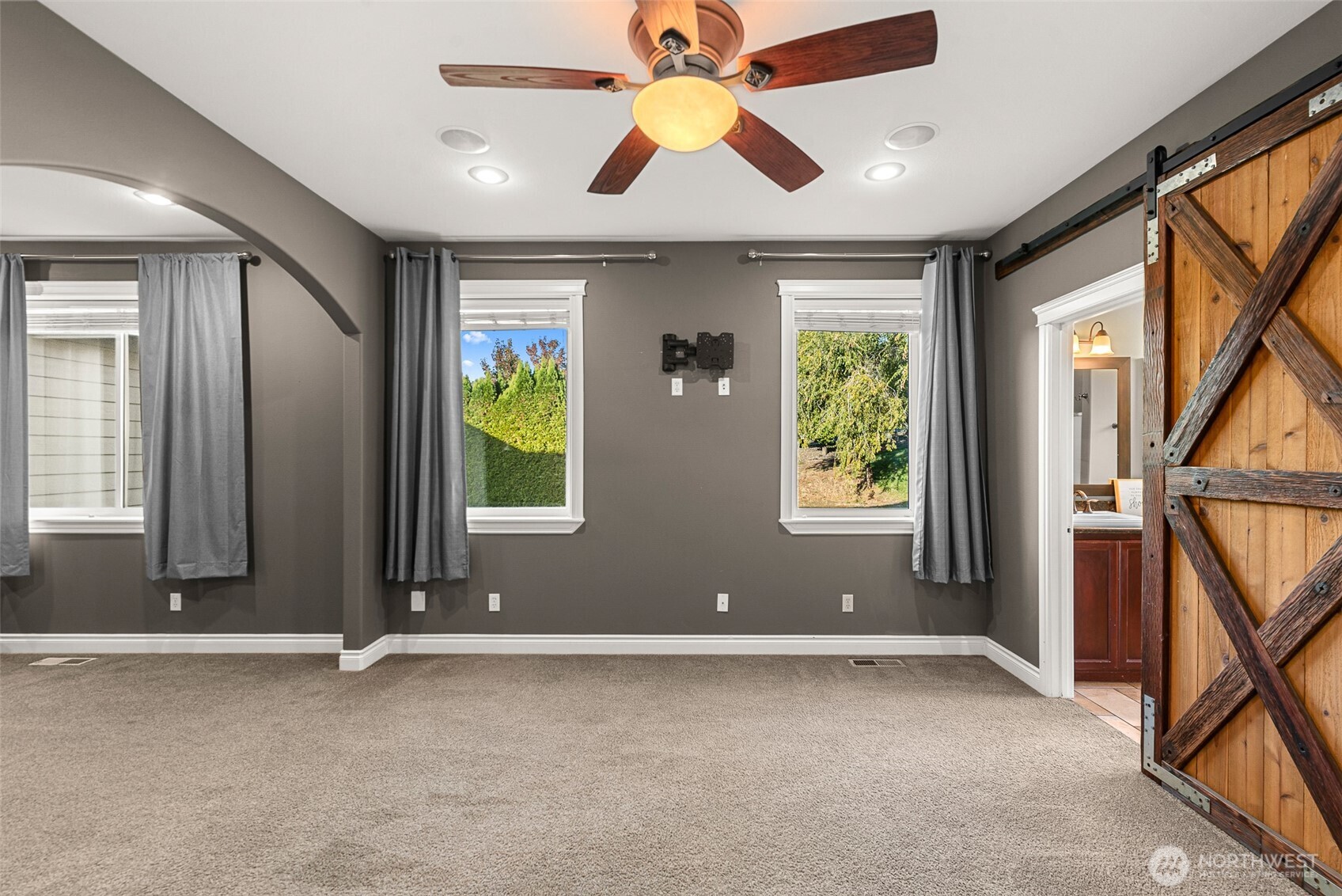 2945 Martin Place East Wenatchee, WA 98802 - Photo 14 of 40 a view of an empty room with window and cabinet
