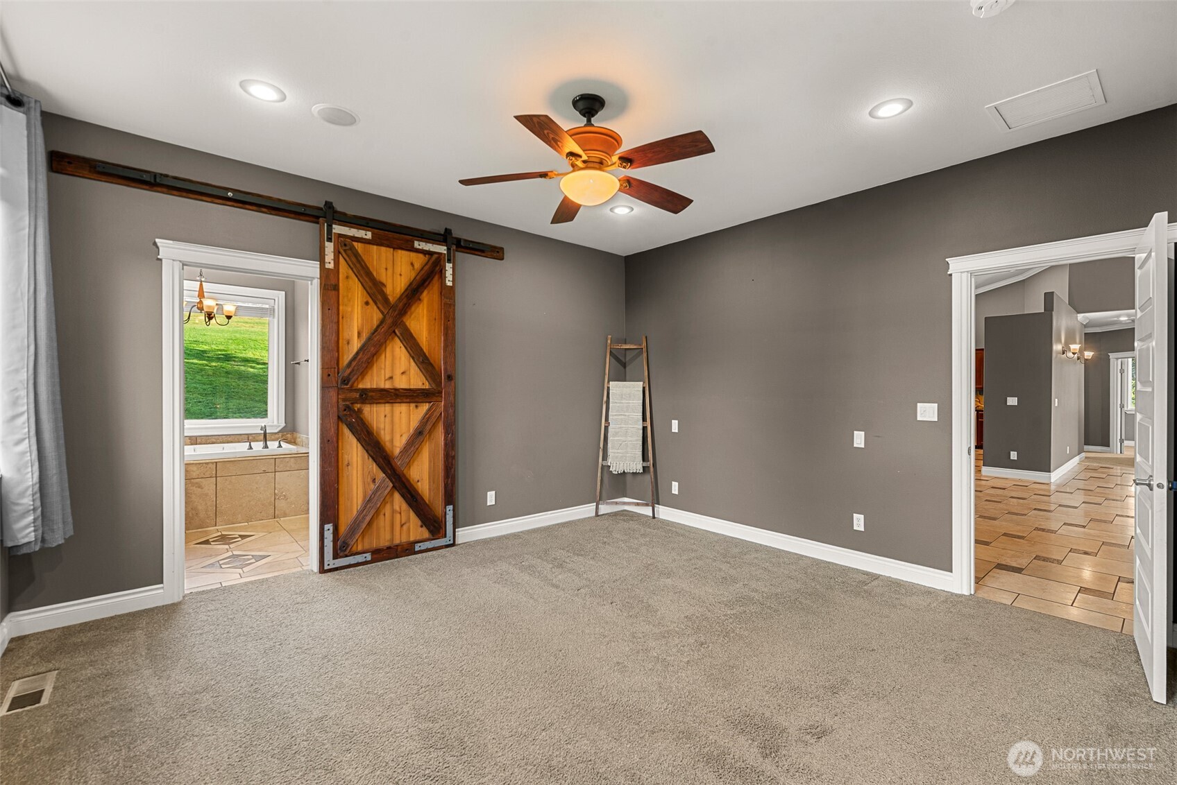 2945 Martin Place East Wenatchee, WA 98802 - Photo 18 of 40 wooden floor in an empty room with a window