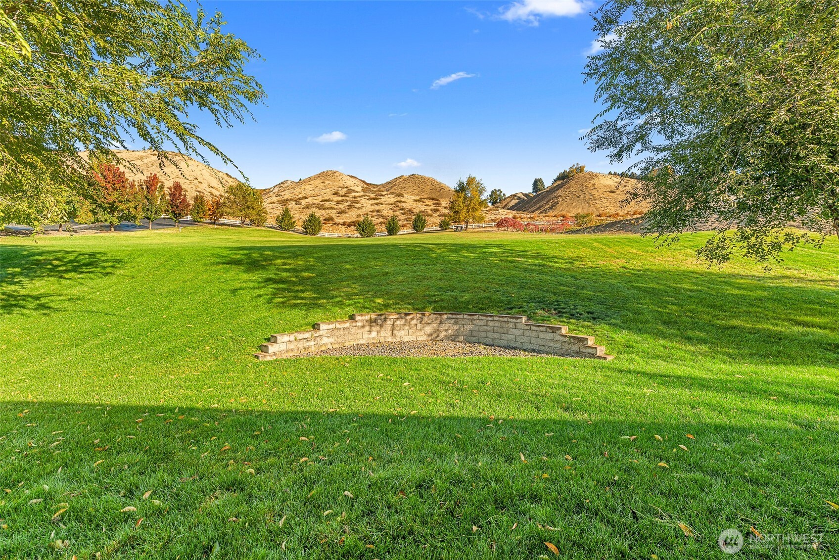 2945 Martin Place East Wenatchee, WA 98802 - Photo 31 of 40 a view of a golf course with a lake
