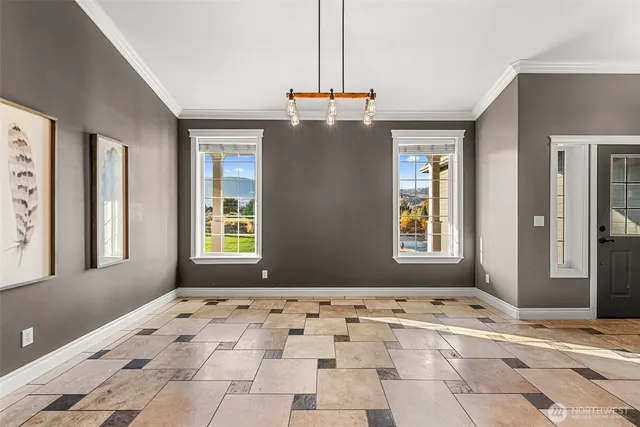 a view of a bedroom with windows