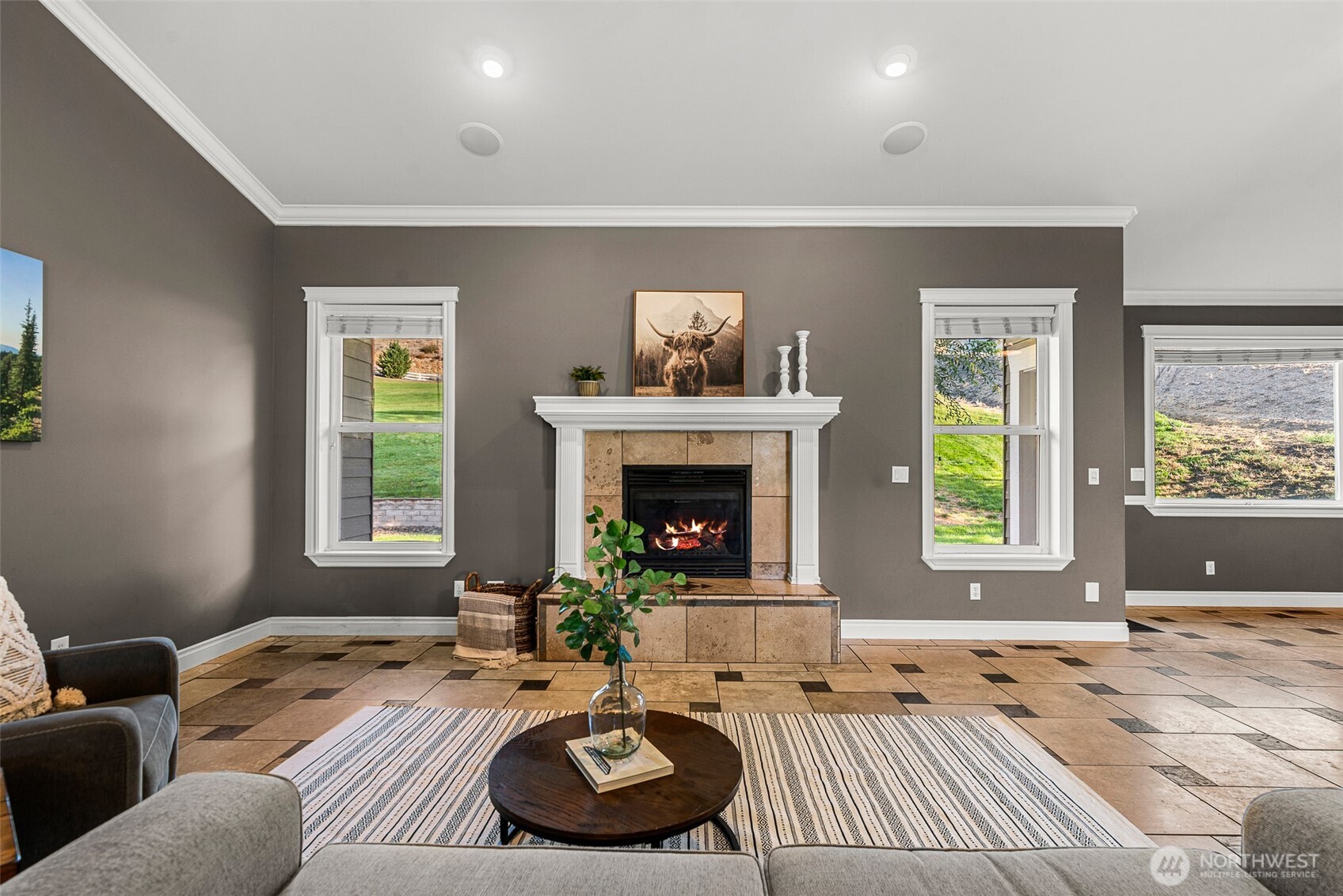 2945 Martin Place East Wenatchee, WA 98802 - Photo 5 of 40 a living room with furniture and a fireplace