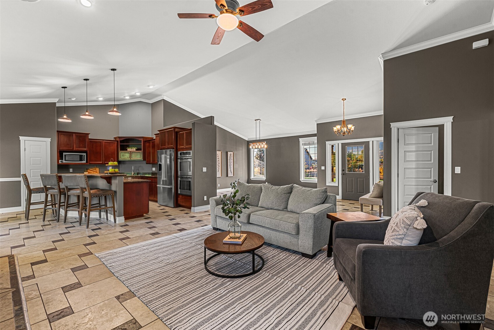 2945 Martin Place East Wenatchee, WA 98802 - Photo 7 of 40 a living room with furniture kitchen view and a large window