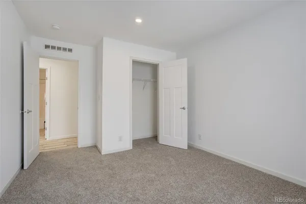 a bathroom with a sink and cabinets