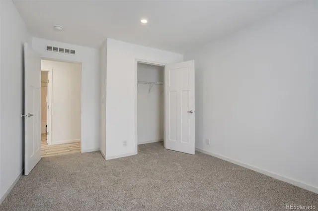 a bathroom with a sink and cabinets