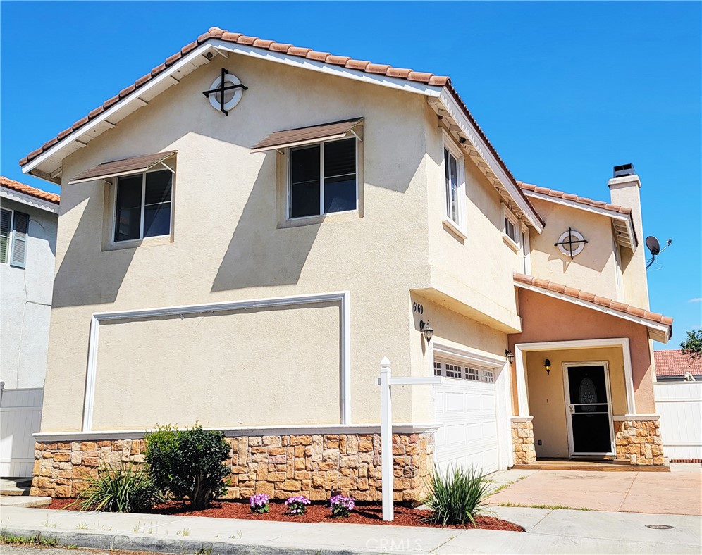 6169 Lapis Way Riverside, CA 92503 - Photo 1 of 1 a front view of a house with a yard