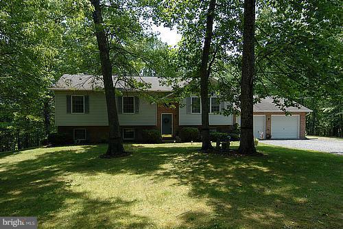9269 Mountjoy Road Marshall, VA 20115 - Photo 14 of 14 a view of a house with a yard