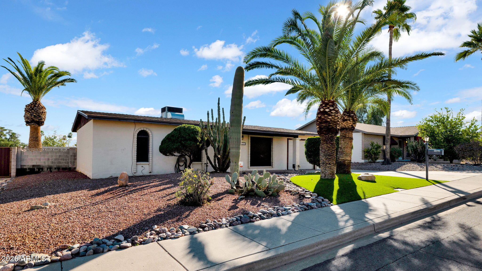 15625 North 20th Street Phoenix, AZ 85022 - Photo 1 of 25 a view of a backyard with swimming pool