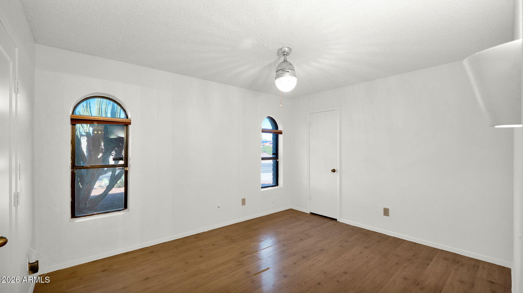 15625 North 20th Street Phoenix, AZ 85022 - Photo 10 of 25 wooden floor in an empty room