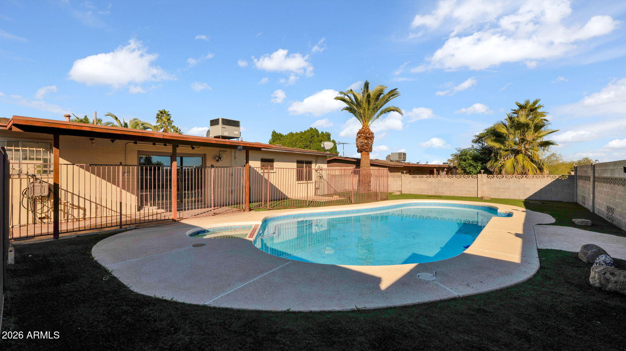 15625 North 20th Street Phoenix, AZ 85022 - Photo 15 of 25 a view of a swimming pool with a lounge chair