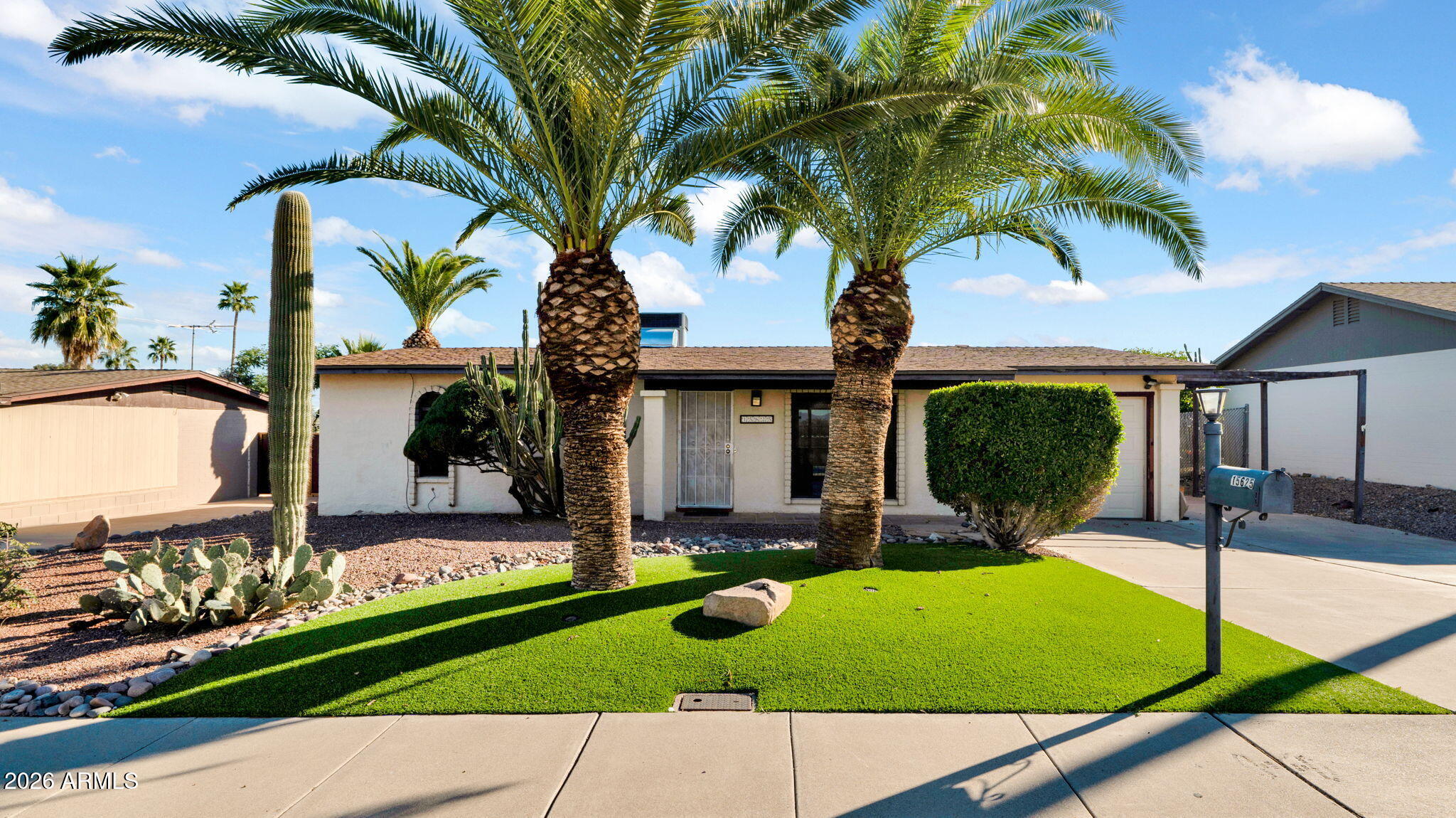 15625 North 20th Street Phoenix, AZ 85022 - Photo 2 of 25 a view of backyard with swimming pool table and chairs