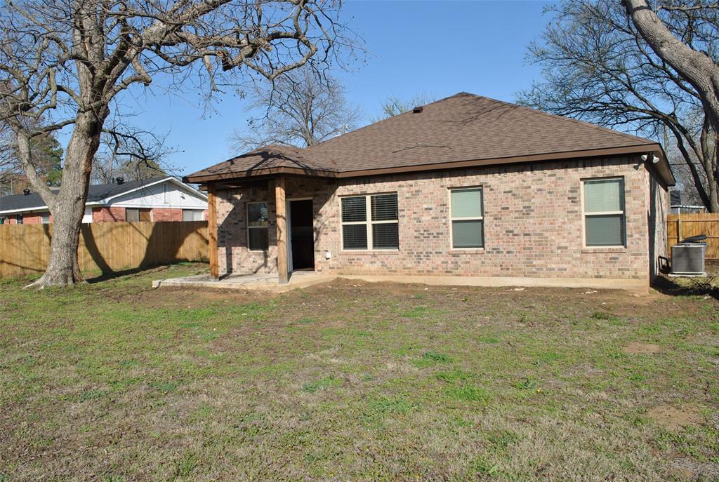 412 Dewitt Street Collinsville, TX 76233 - Photo 15 of 17 a house view with a garden space