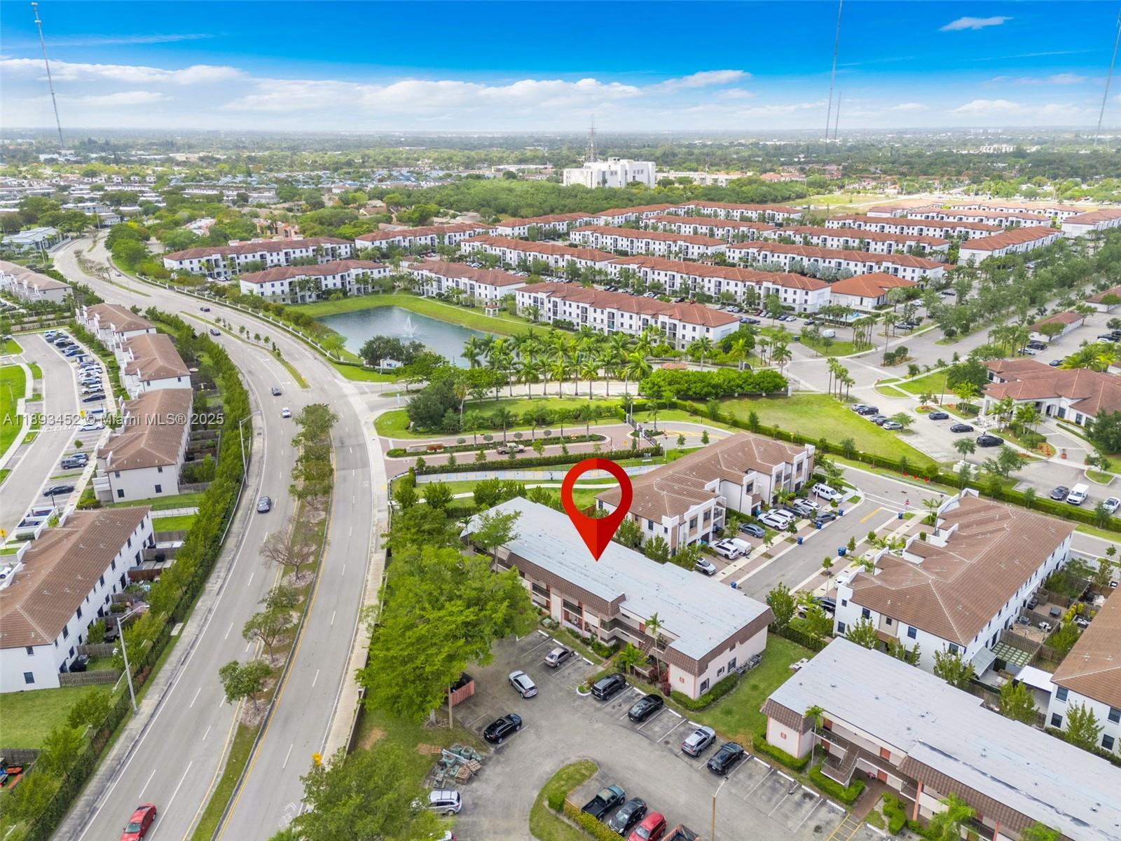 821 Northeast 207th Lane, Unit 1105 Miami, FL 33179 - Photo 9 of 12 an aerial view of a city