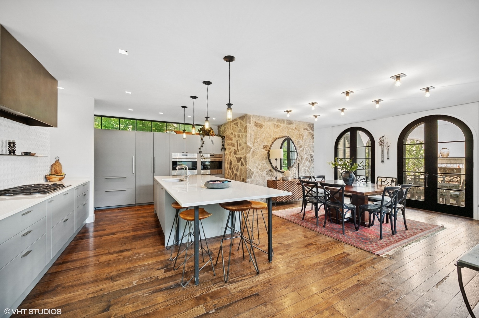 1331 Asbury Avenue Evanston, IL 60201 - Photo 12 of 46 a large kitchen with a table and chairs in it