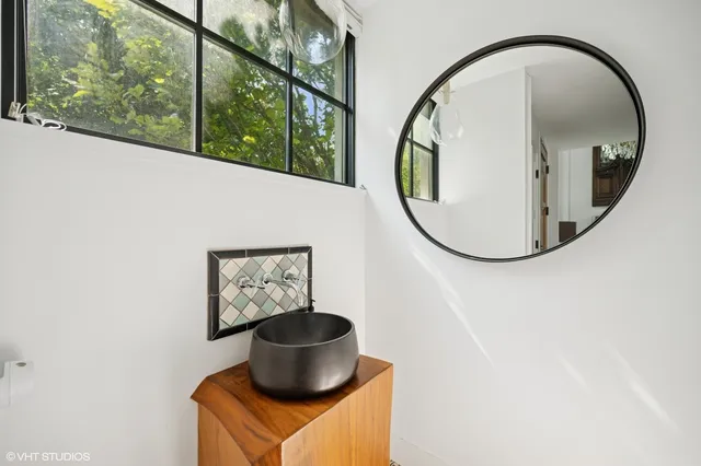 a vase of flowers sitting on a table