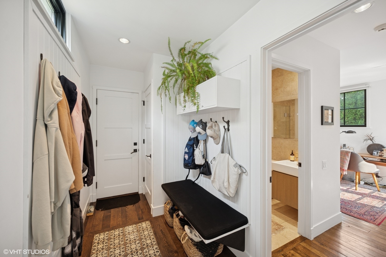 1331 Asbury Avenue Evanston, IL 60201 - Photo 23 of 46 a view of walk in closet with clothes and shoes