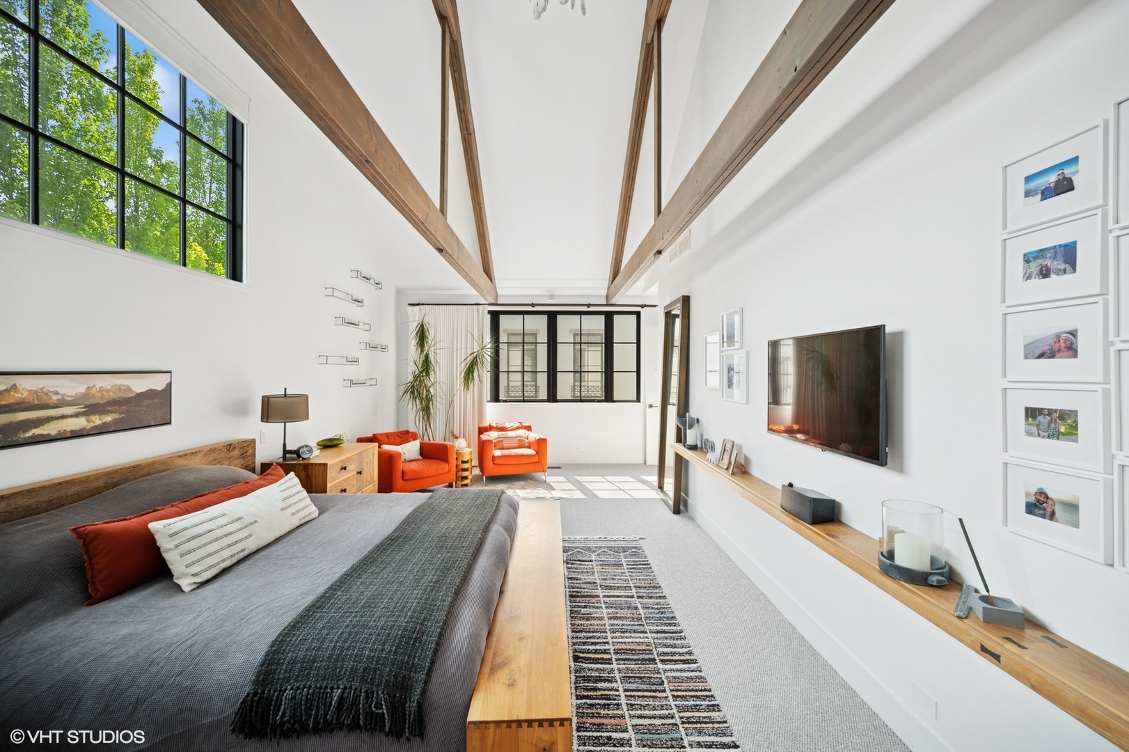 1331 Asbury Avenue Evanston, IL 60201 - Photo 27 of 46 a bedroom with furniture and a flat screen tv