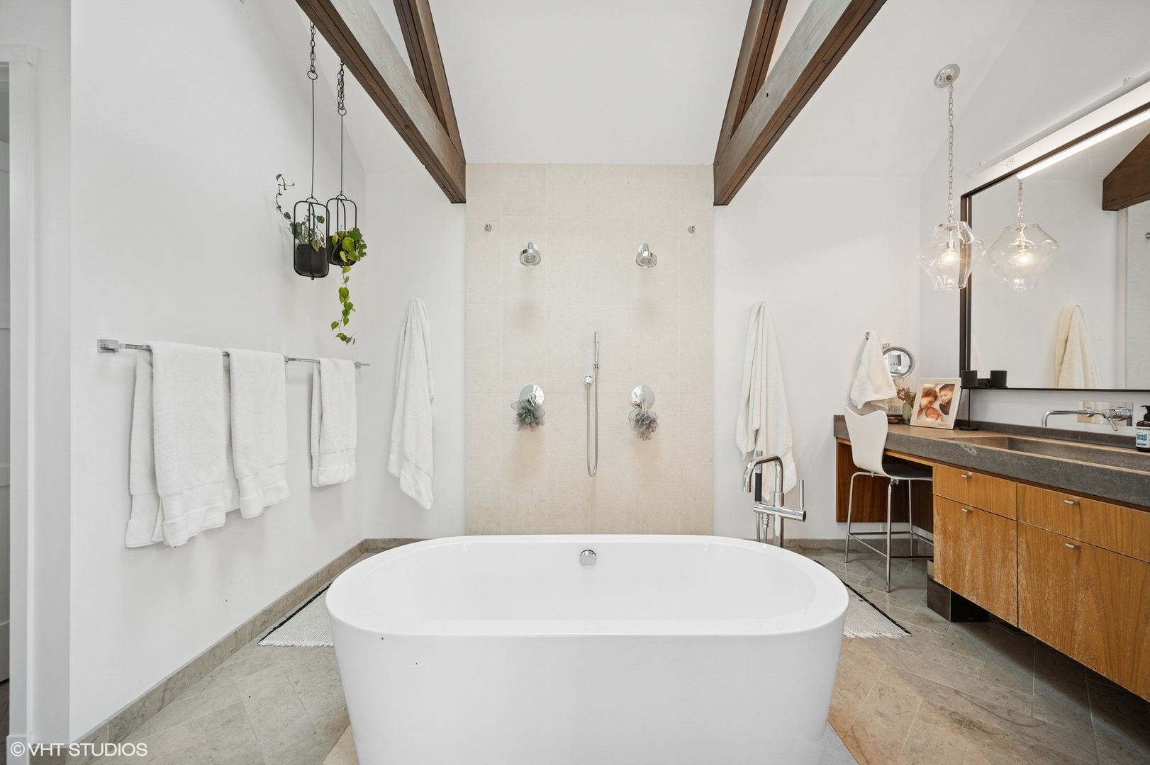 1331 Asbury Avenue Evanston, IL 60201 - Photo 29 of 46 a white bath tub sitting in a bathroom