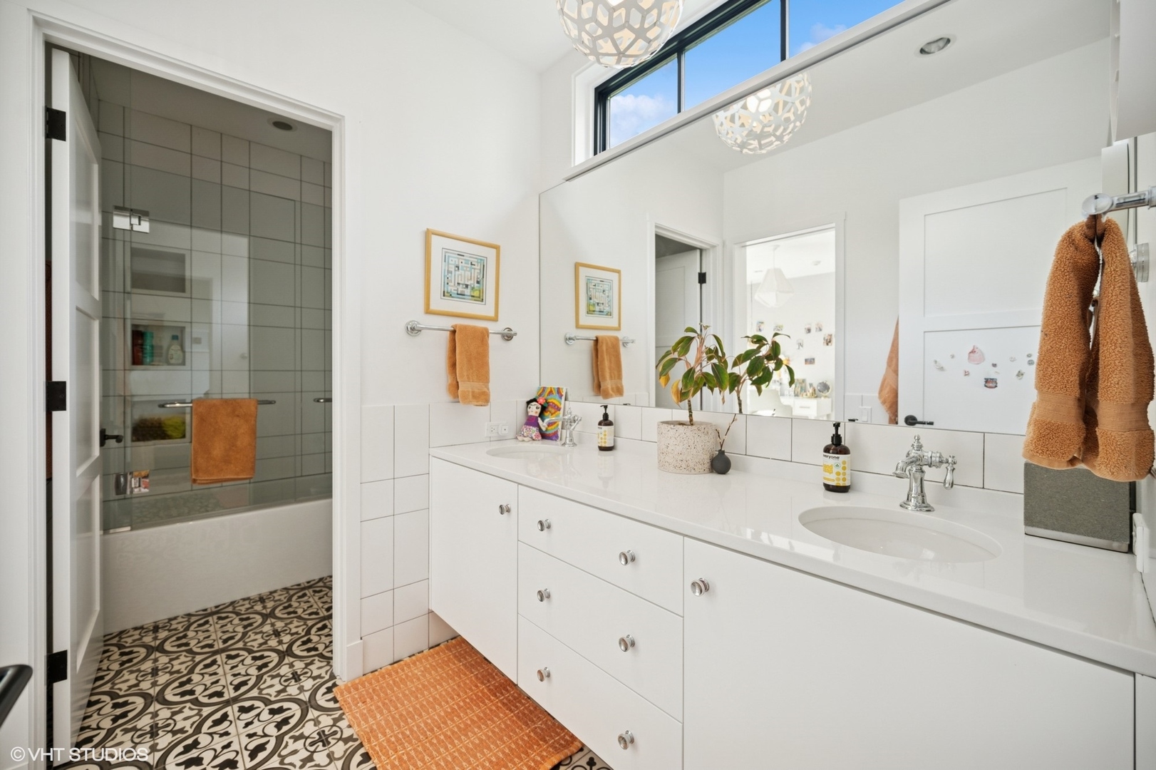 1331 Asbury Avenue Evanston, IL 60201 - Photo 32 of 46 a bathroom with a sink and a mirror
