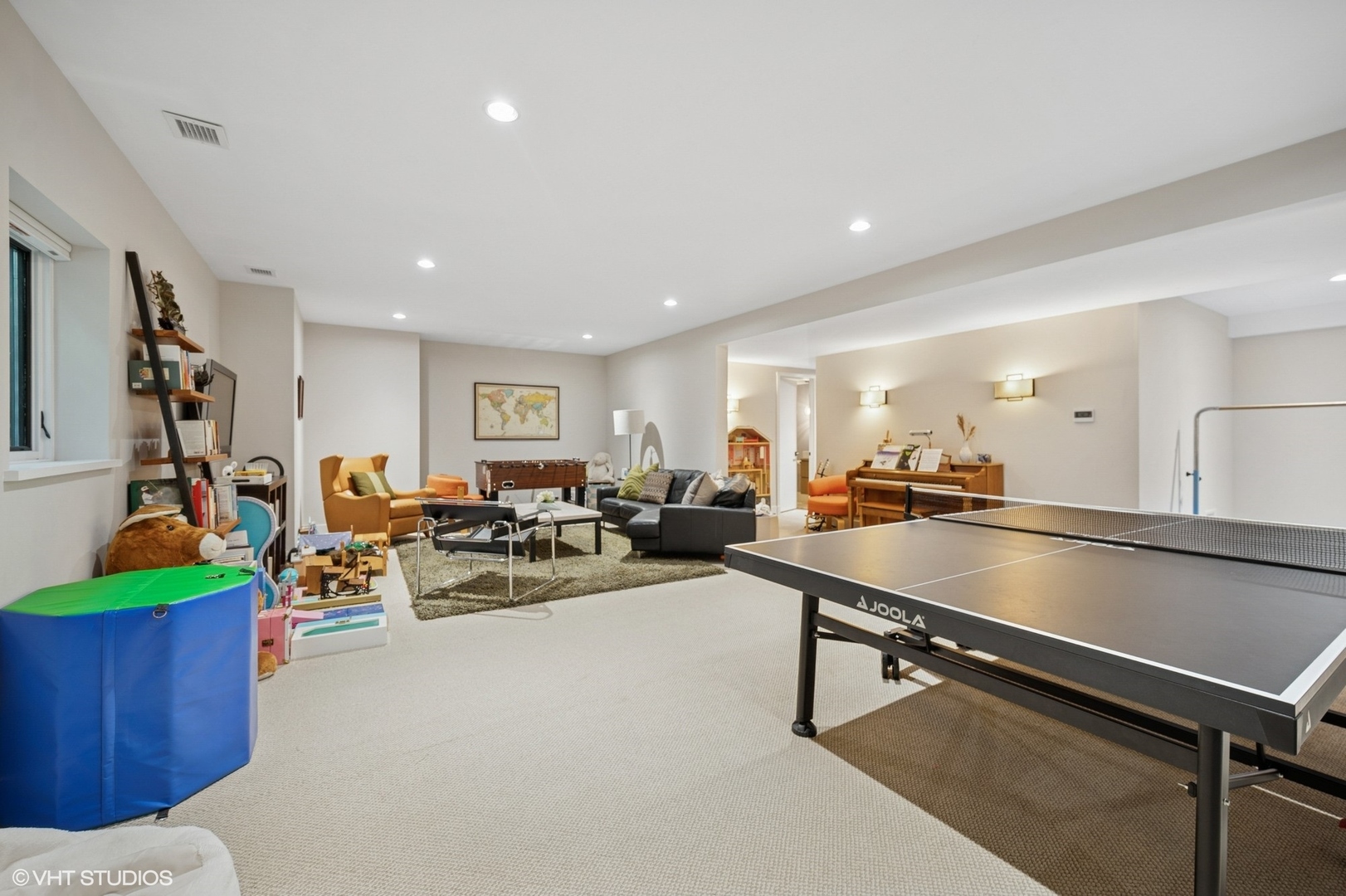 1331 Asbury Avenue Evanston, IL 60201 - Photo 36 of 46 a living room with lots of furniture and a chandelier