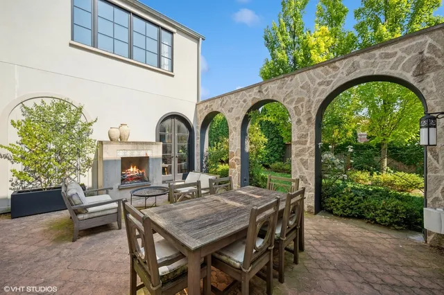 a view of a couches and a table in the patio