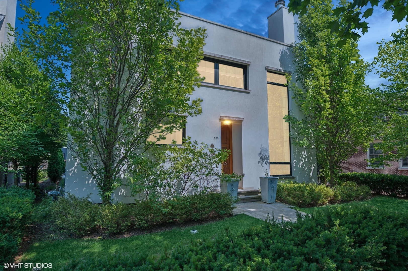 1331 Asbury Avenue Evanston, IL 60201 - Photo 42 of 46 a view of a building with a yard