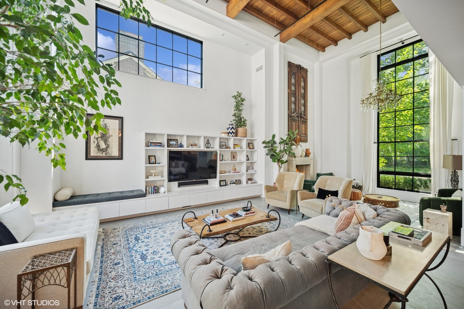 1331 Asbury Avenue Evanston, IL 60201 - Photo 8 of 46 a living room with furniture a flat screen tv and a large window