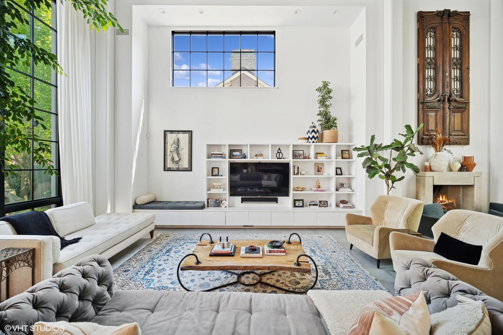 1331 Asbury Avenue Evanston, IL 60201 - Photo 10 of 46 a living room with furniture a fireplace and a potted plant