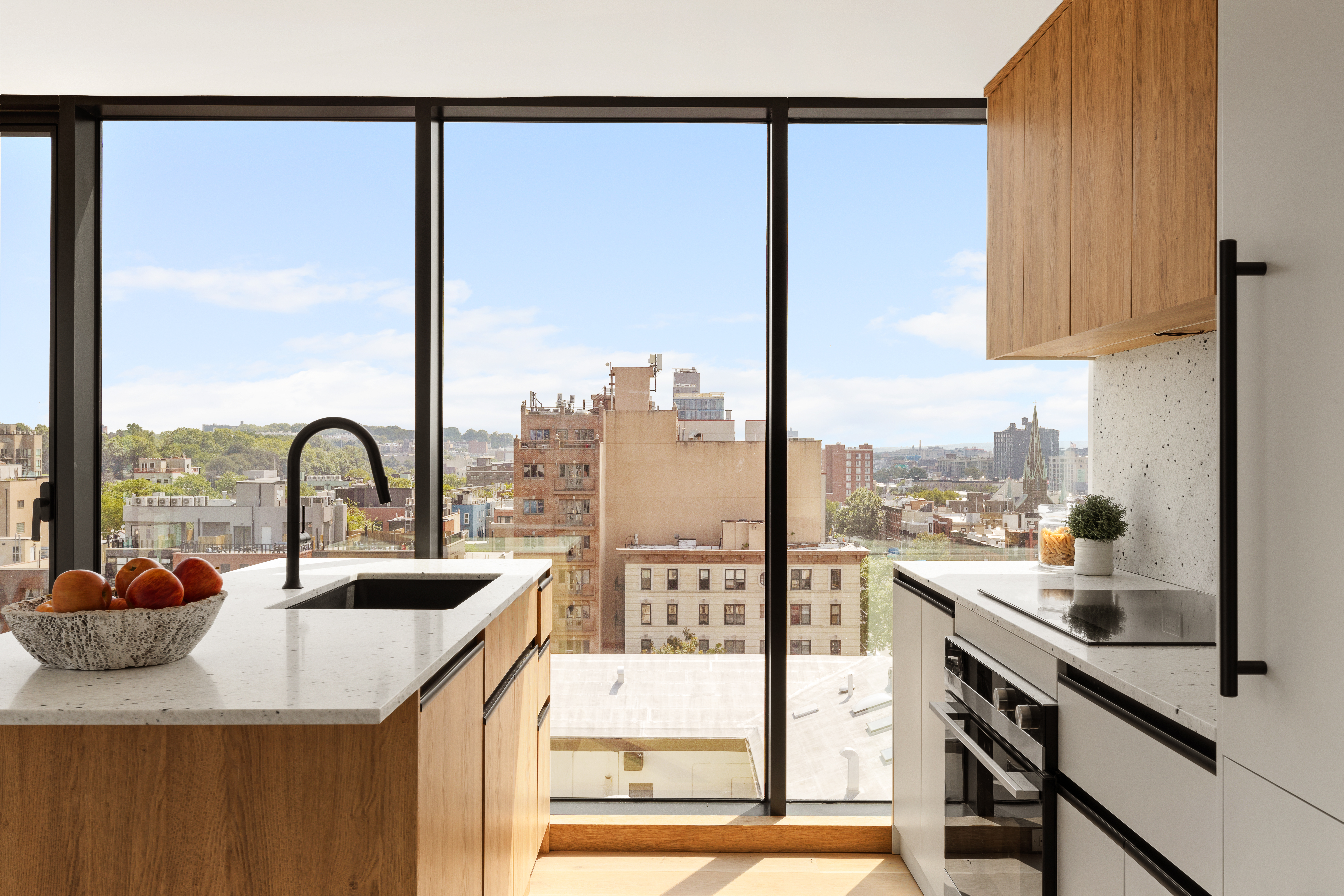 179 20th Street, Unit 6C Brooklyn, NY 11232 - Photo 3 of 11 a view of a kitchen with a sink and cabinets