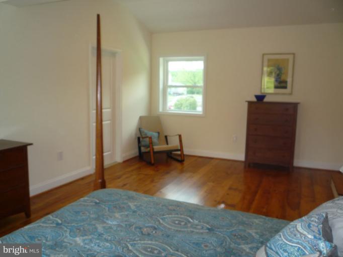 20300 Whites Ferry Road Poolesville, MD 20837 - Photo 23 of 30 a view of a livingroom with workspace and a window