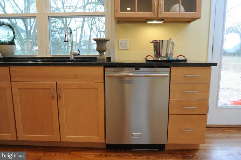 20300 Whites Ferry Road Poolesville, MD 20837 - Photo 6 of 30 a view of a kitchen with a sink and a window